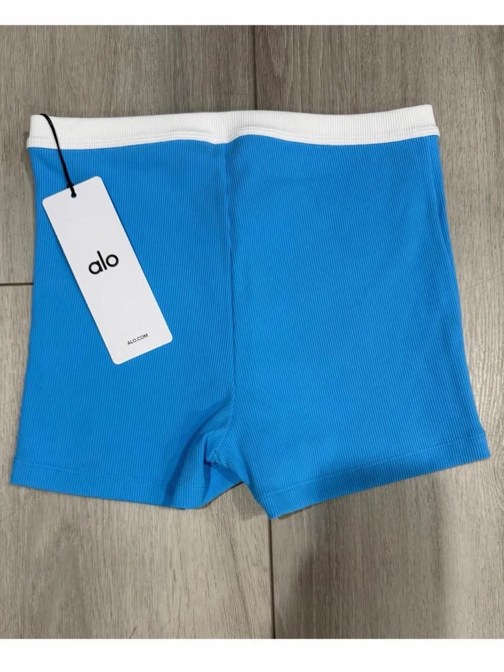 ALO Yoga Ribbed High-Rise Bike Shorts in Bright Blue with White Waistband